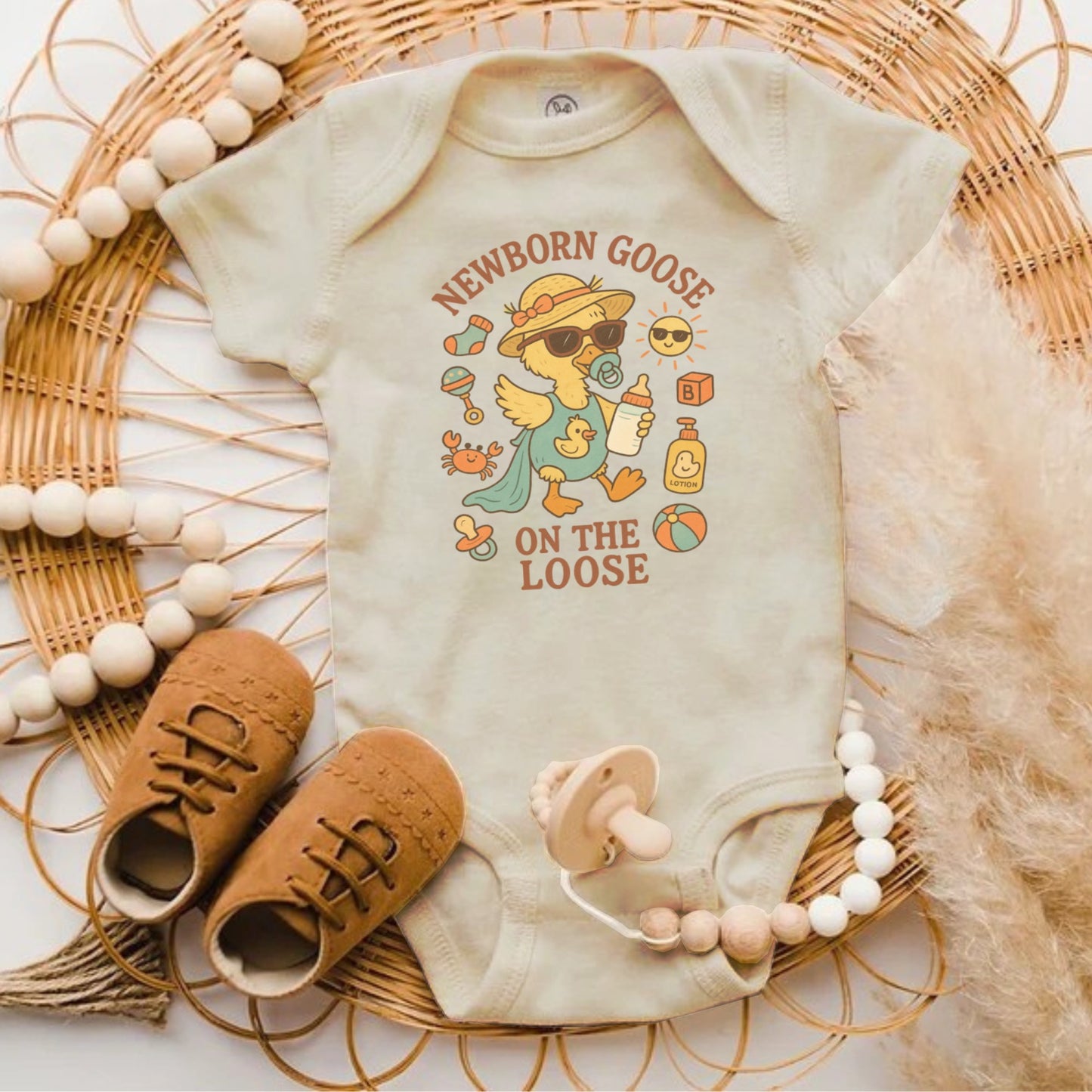 Newborn Goose On The Loose Graphic Onesie product type