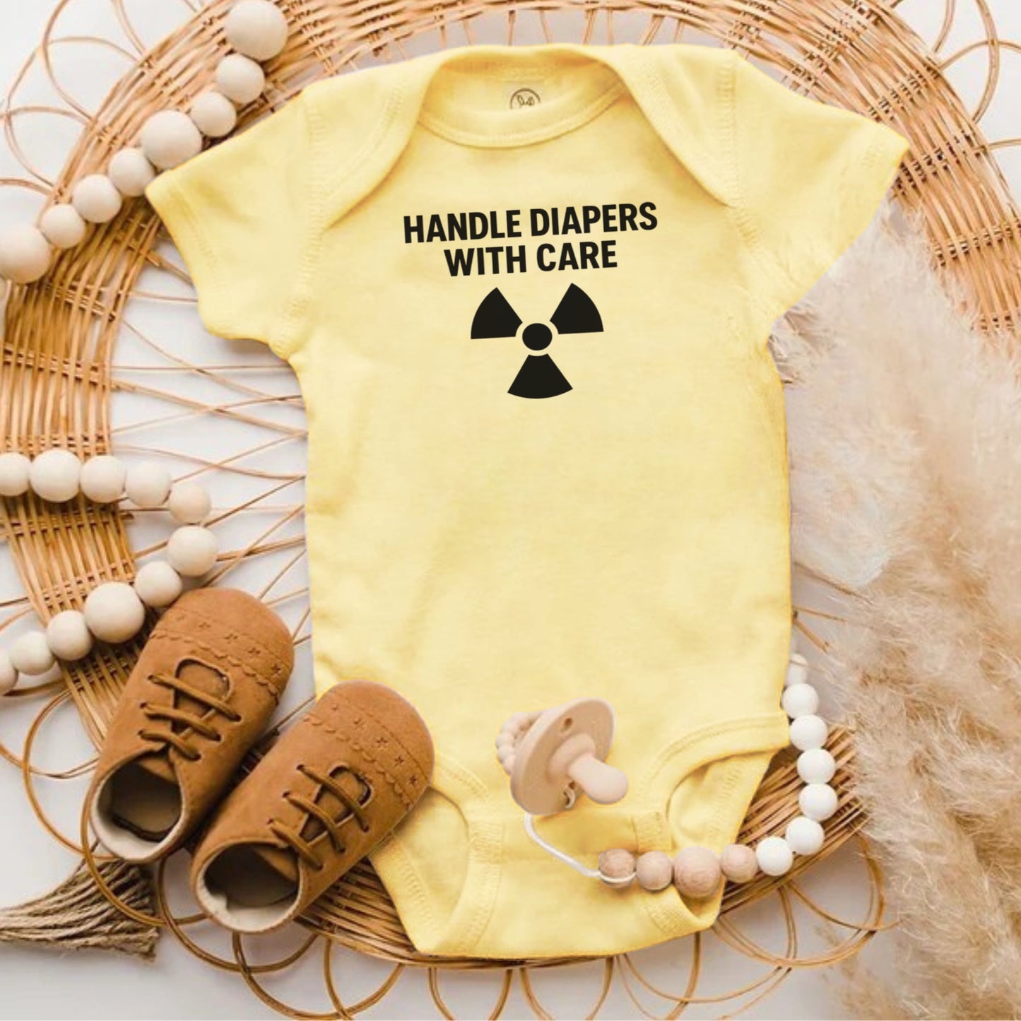 Handle Diapers With Care Funny Baby Onesie product
