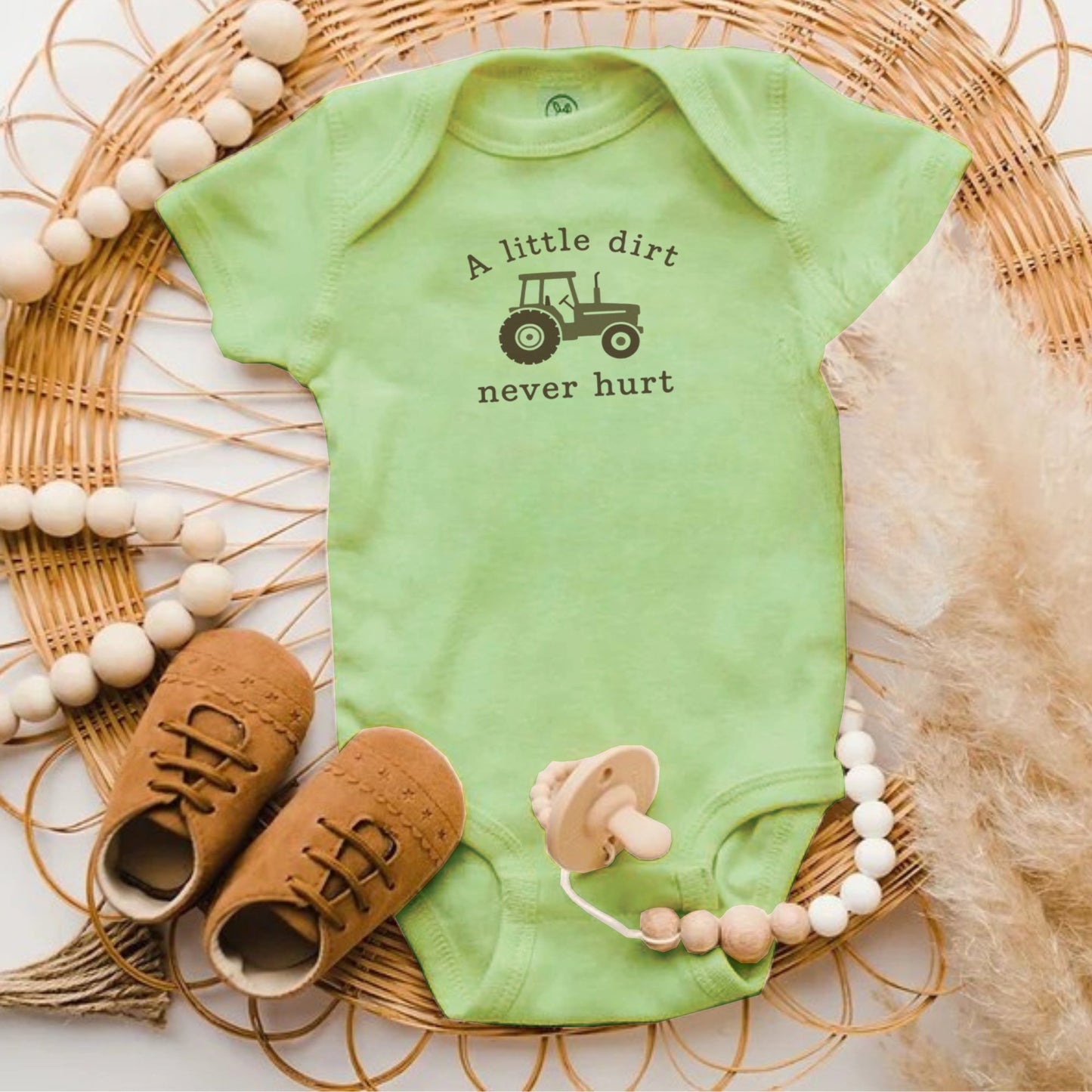 A Little Dirt Never Hurt Green Baby Onesie product