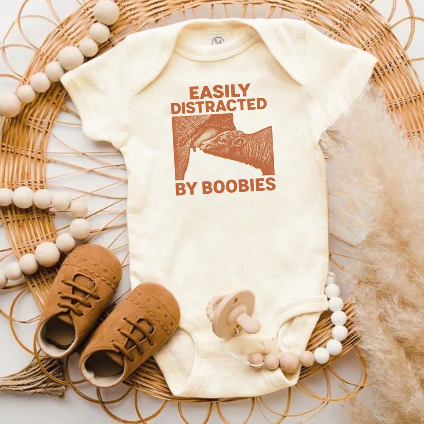 Easily Distracted by Boobies Funny Baby product