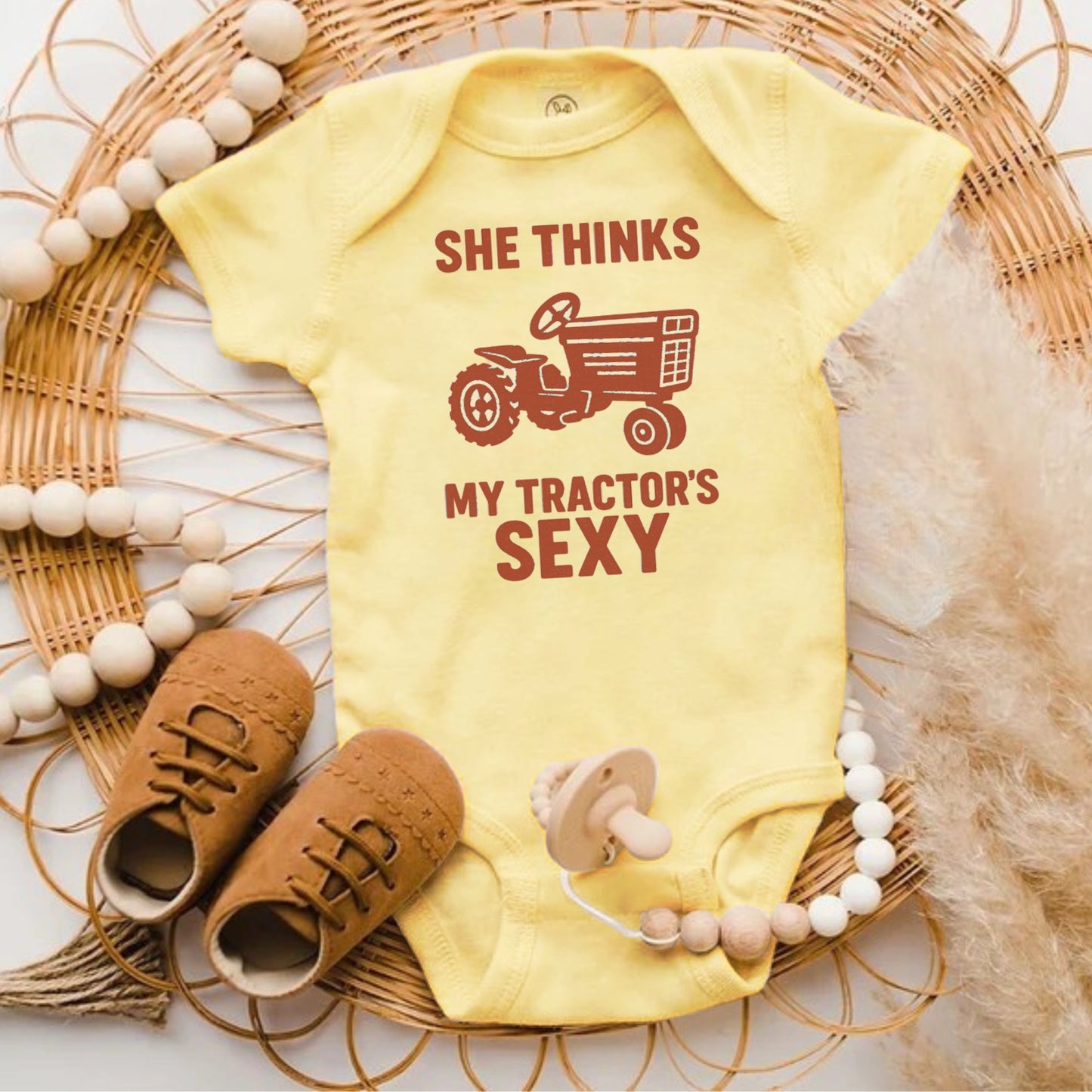 She Thinks My Tractor's Sexy Baby Onesie product type