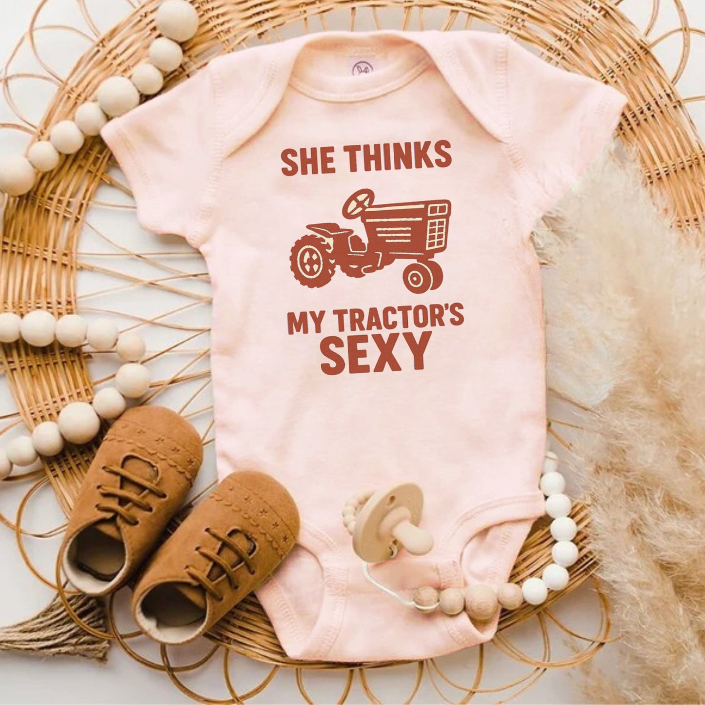 She Thinks My Tractor's Sexy Baby Onesie product