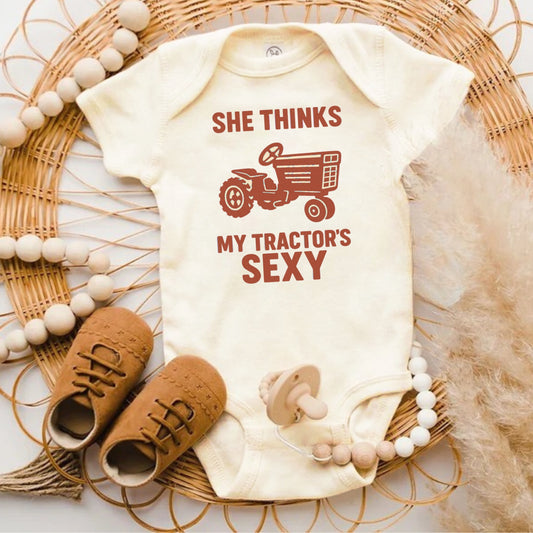 She Thinks My Tractor's Sexy Baby Bodysuit product